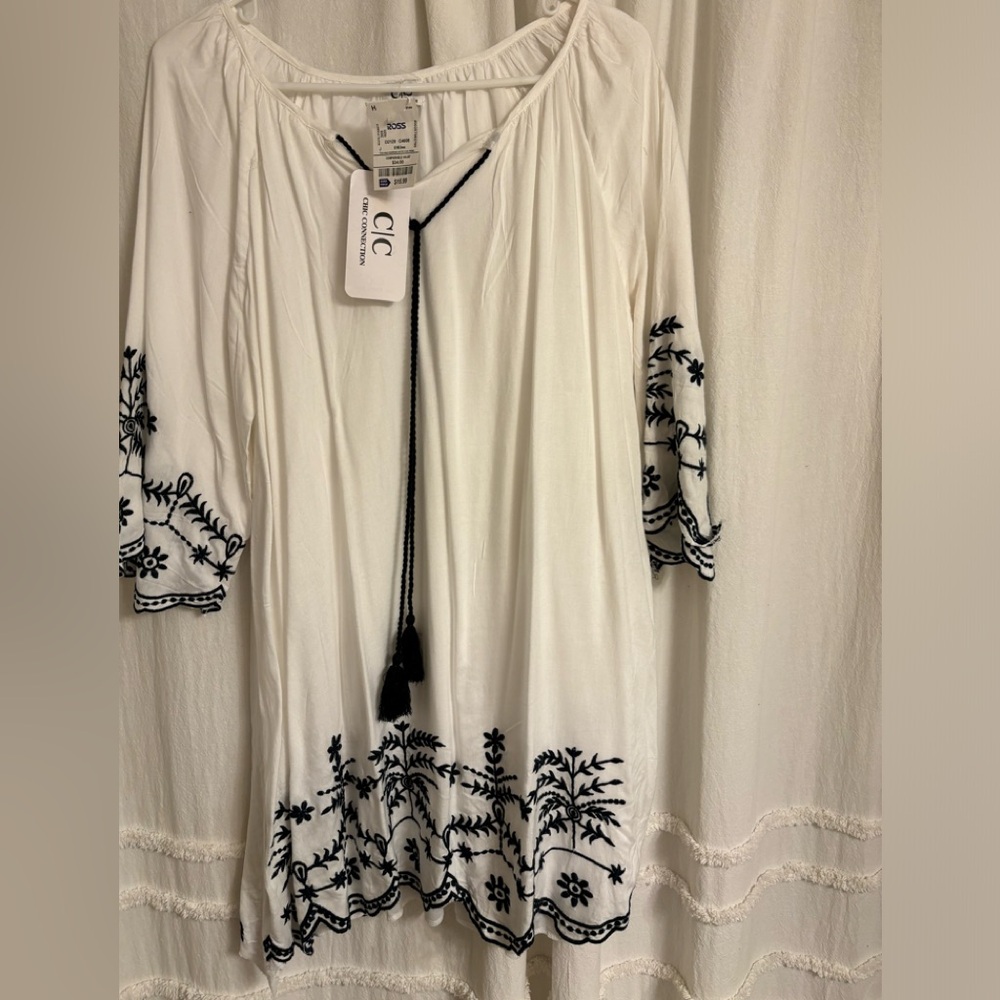 White summer dress with navy blue flower print